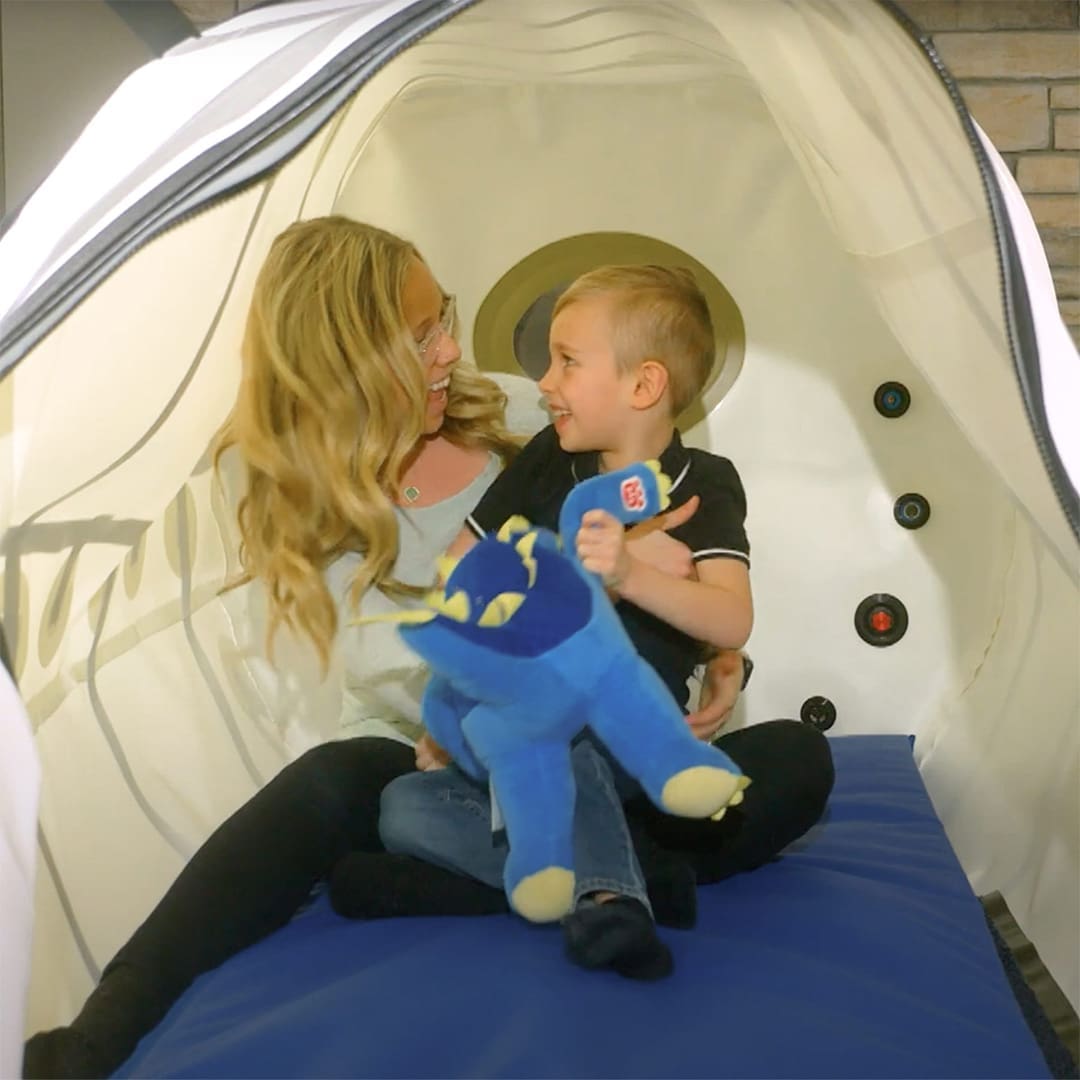 Mother and Son in Hyperbaric Oxygen Chamber